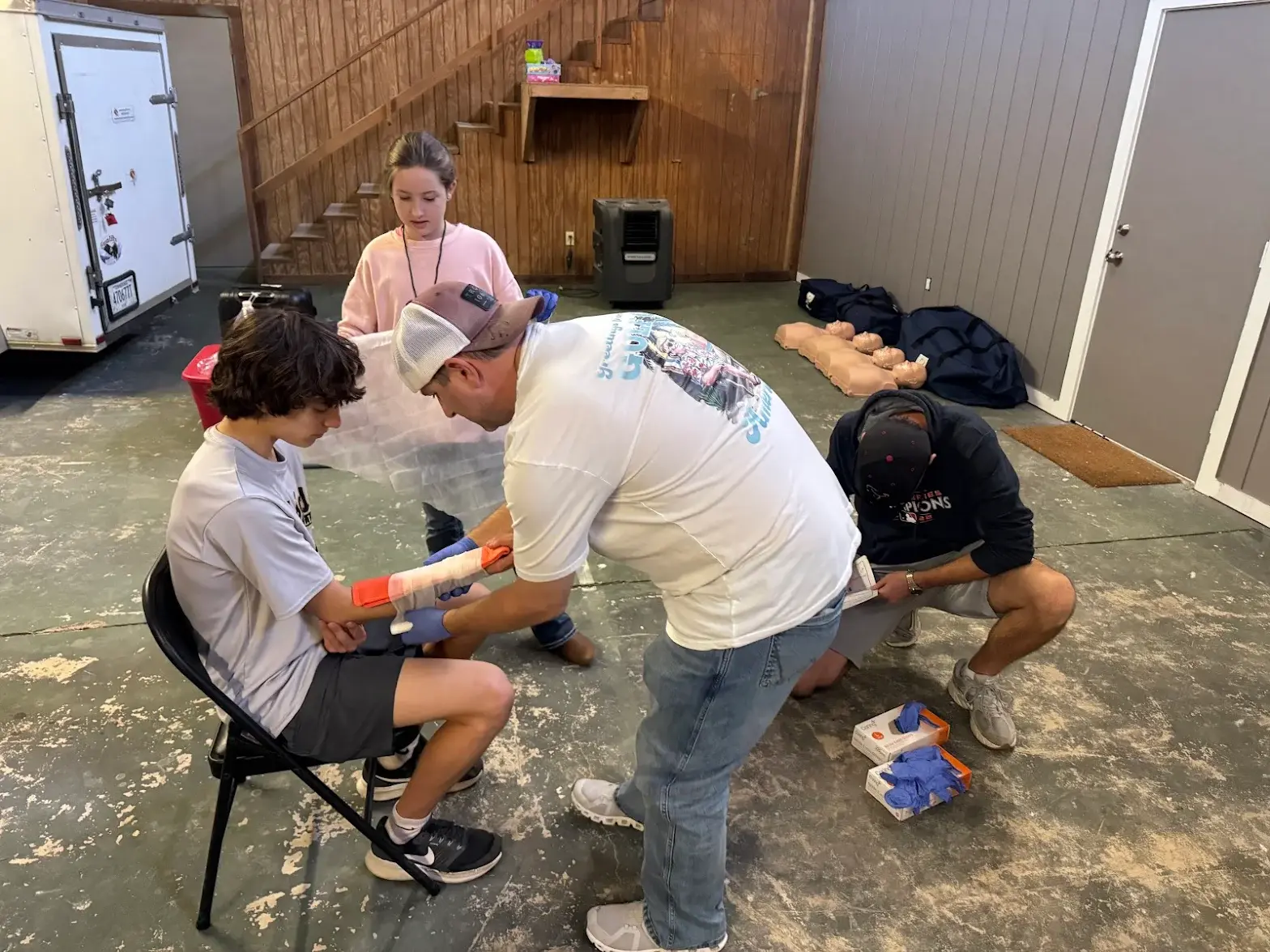 The Big Texas CPR team in action, training students life saving emergency techniques.